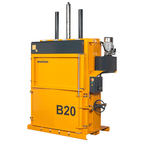 Yellow, medium-sized downstroke vertical baler